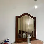 Quarto em Acomodações Particulares Casa Da Clô *